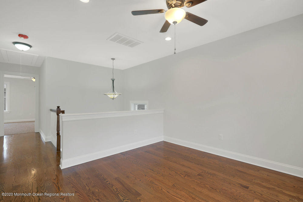 154 Pinehurst Road Brick, NJ 08723 - Photo 17 of 36 a view of a room with wooden floor and fan