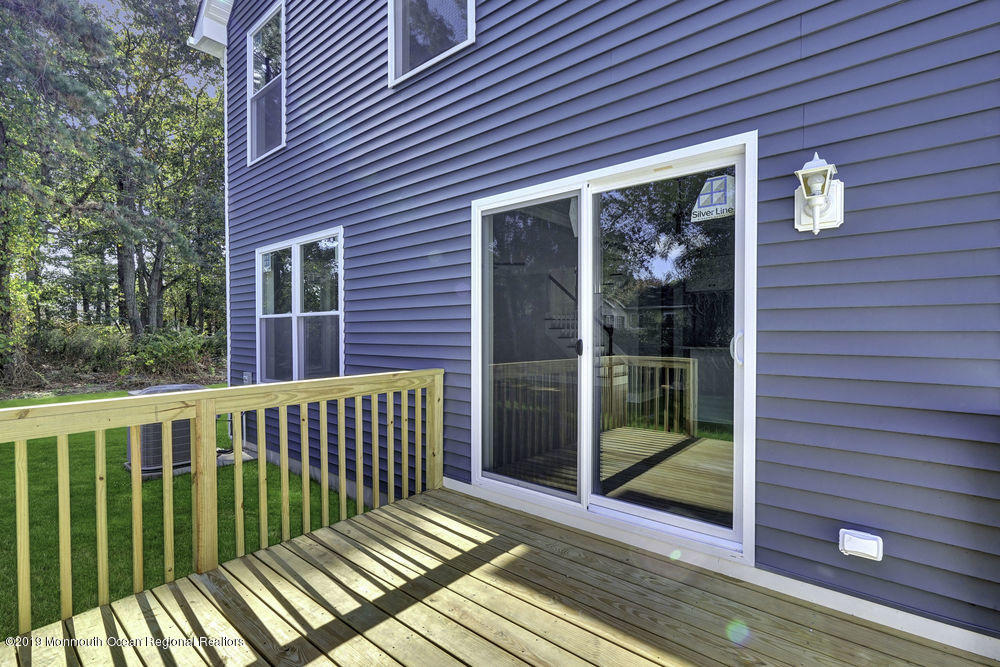 154 Pinehurst Road Brick, NJ 08723 - Photo 35 of 36 a view of a wooden deck