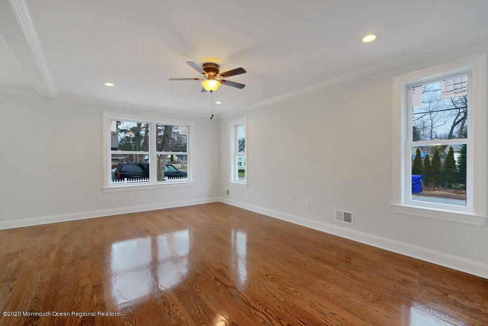 154 Pinehurst Road Brick, NJ 08723 - Photo 4 of 36 wooden floor in an empty room with a window