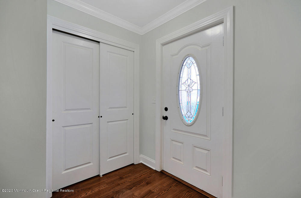 154 Pinehurst Road Brick, NJ 08723 - Photo 8 of 36 a view of front door with wooden floor