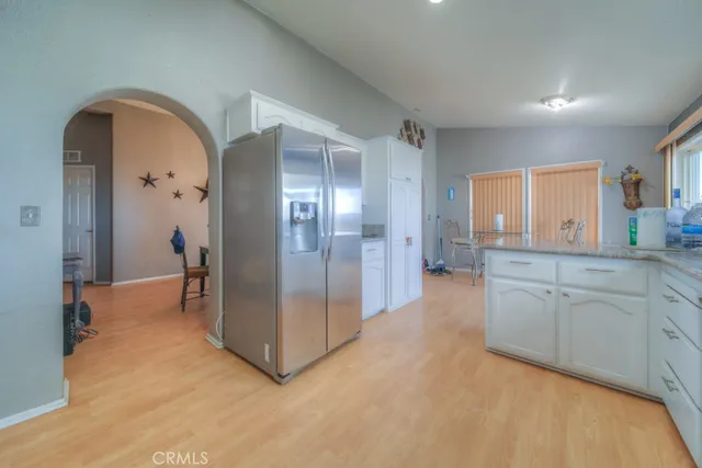 a bedroom with a bed and a walk in closet