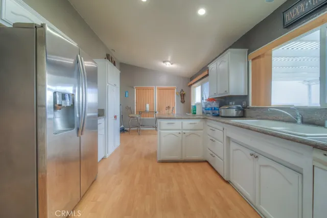 a view of a bathroom from a hallway