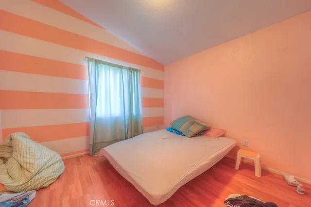a spacious bathroom with a tub shower and sink