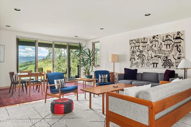 a bedroom with a bed and a desk