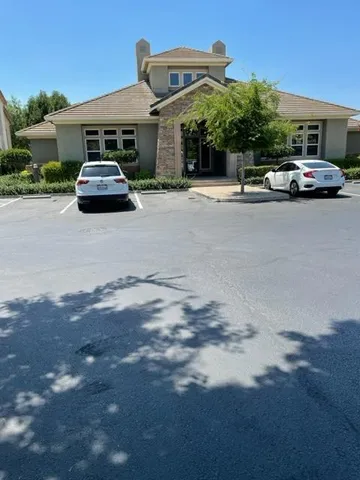 a view of a street with cars