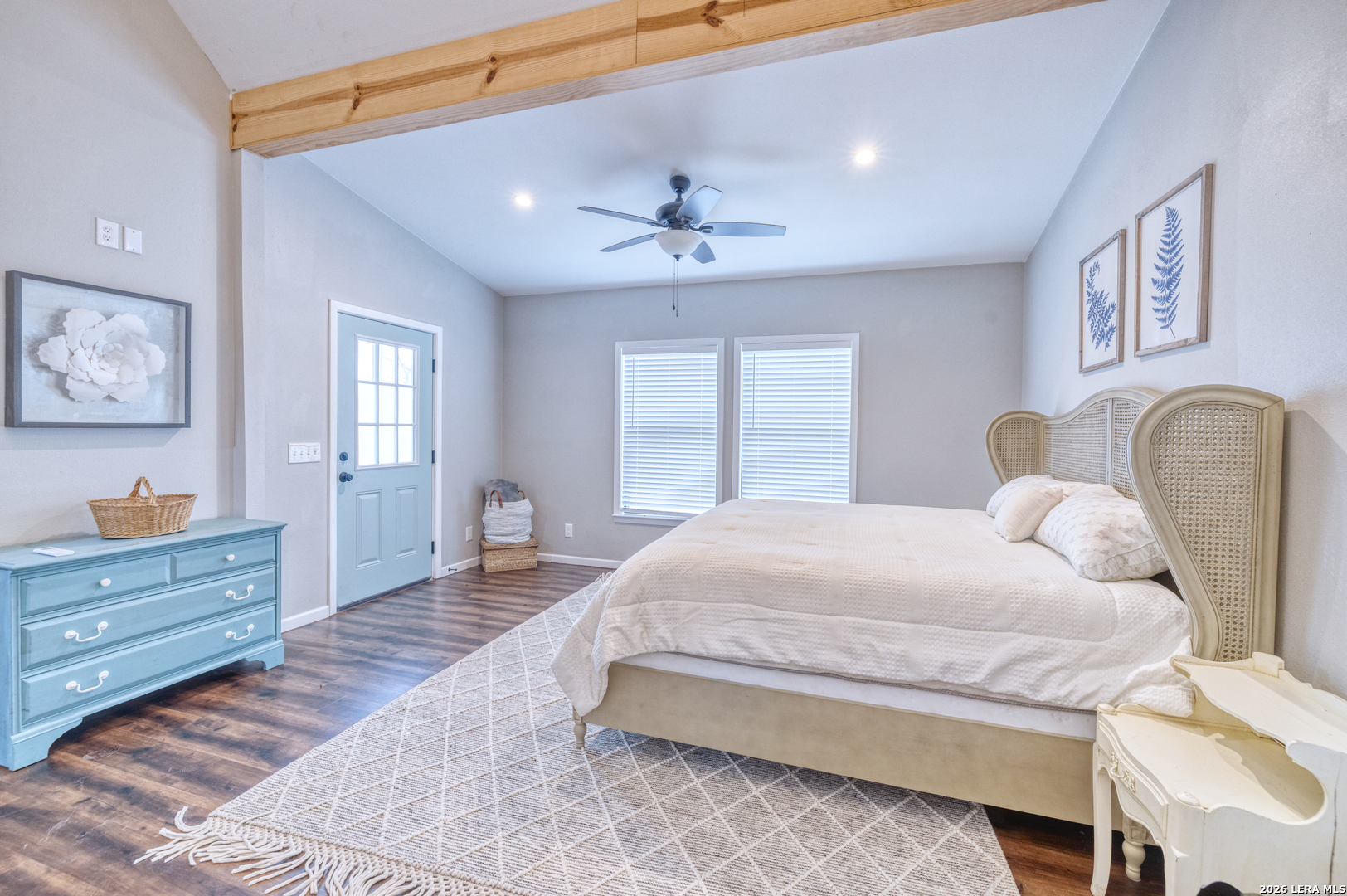 1674 Flat Rock Road Rio Frio, TX 78879 - Photo 21 of 39 a bedroom with a bed and wooden floor