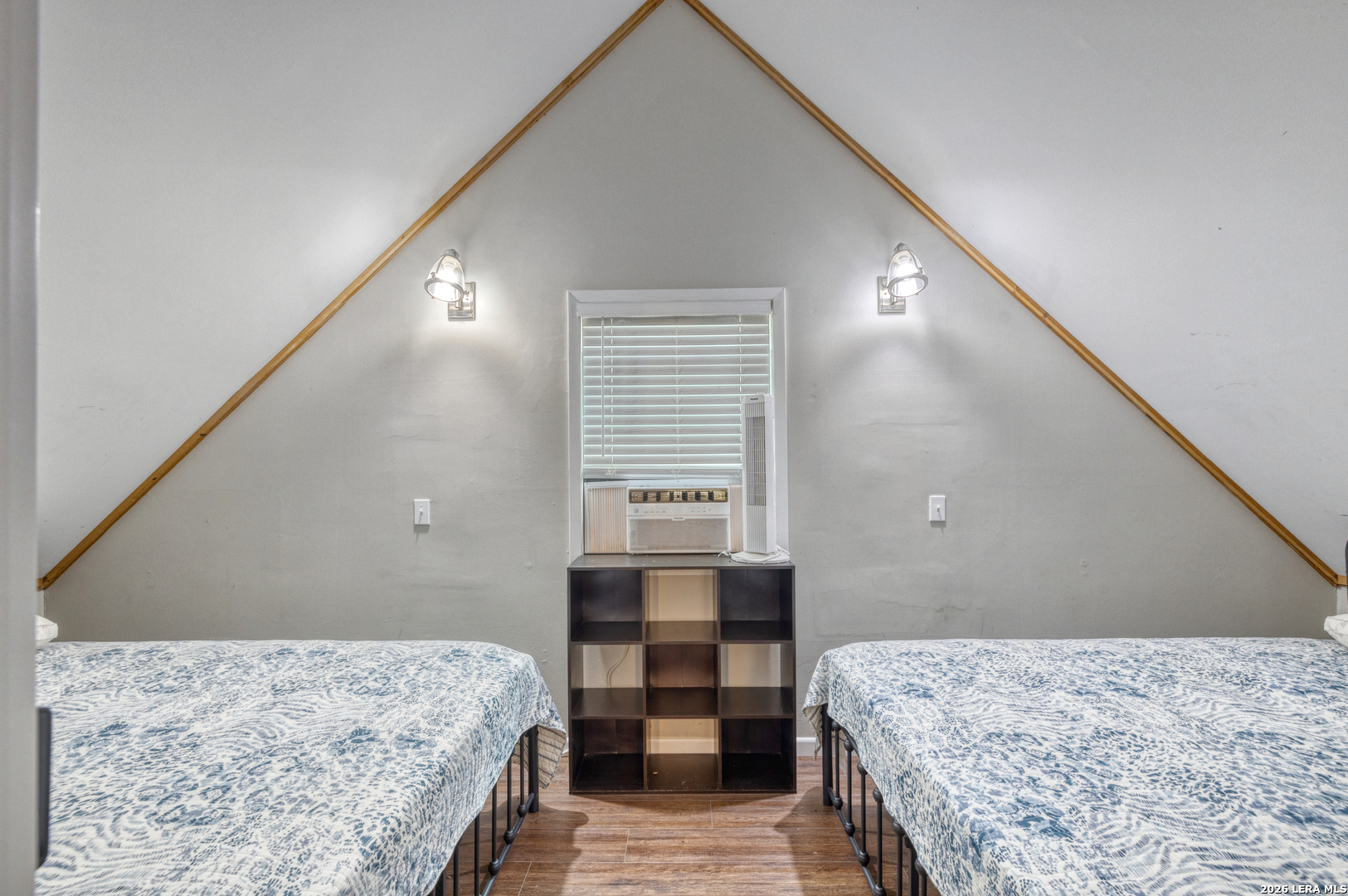 1674 Flat Rock Road Rio Frio, TX 78879 - Photo 29 of 39 a bedroom with a bed and a dresser