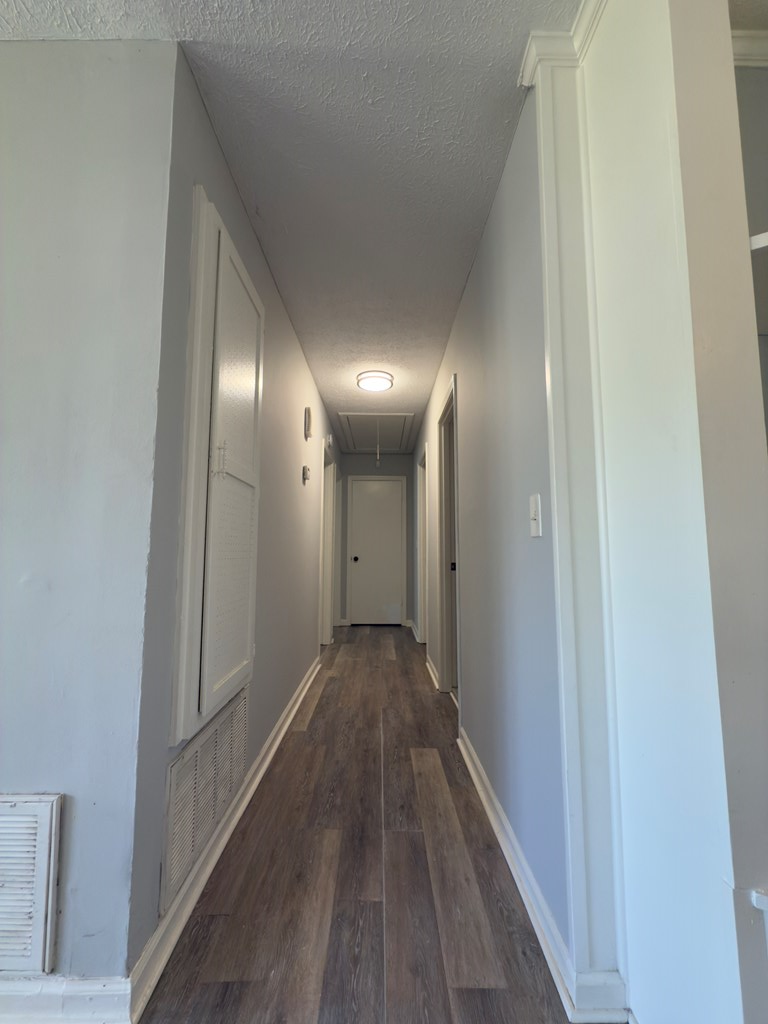 5829 Moon Road Columbus, GA 31909 - Photo 11 of 20 a view of hallway with wooden floor