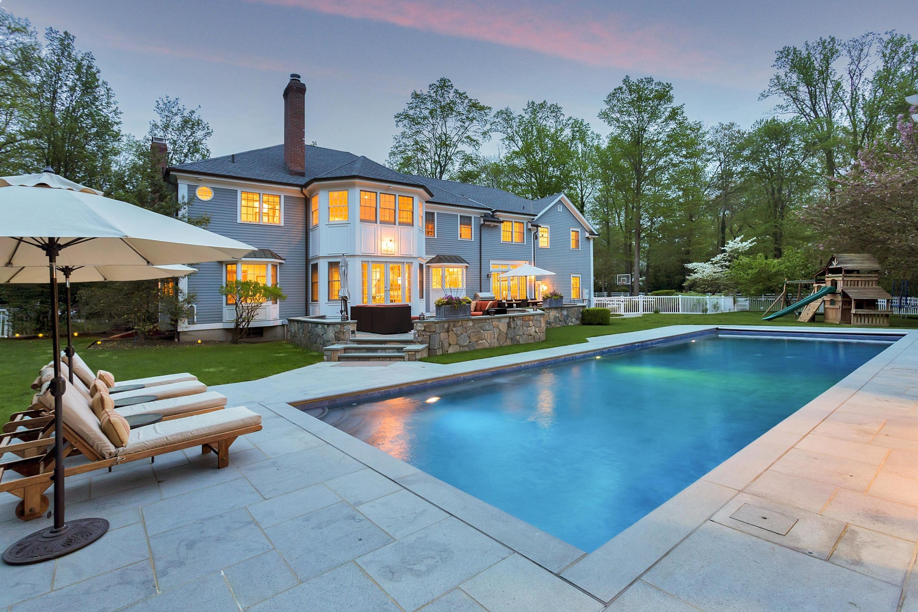 495 Hollow Tree Ridge Road Darien, CT 06820 - Photo 3 of 33 a view of swimming pool with chairs and tables