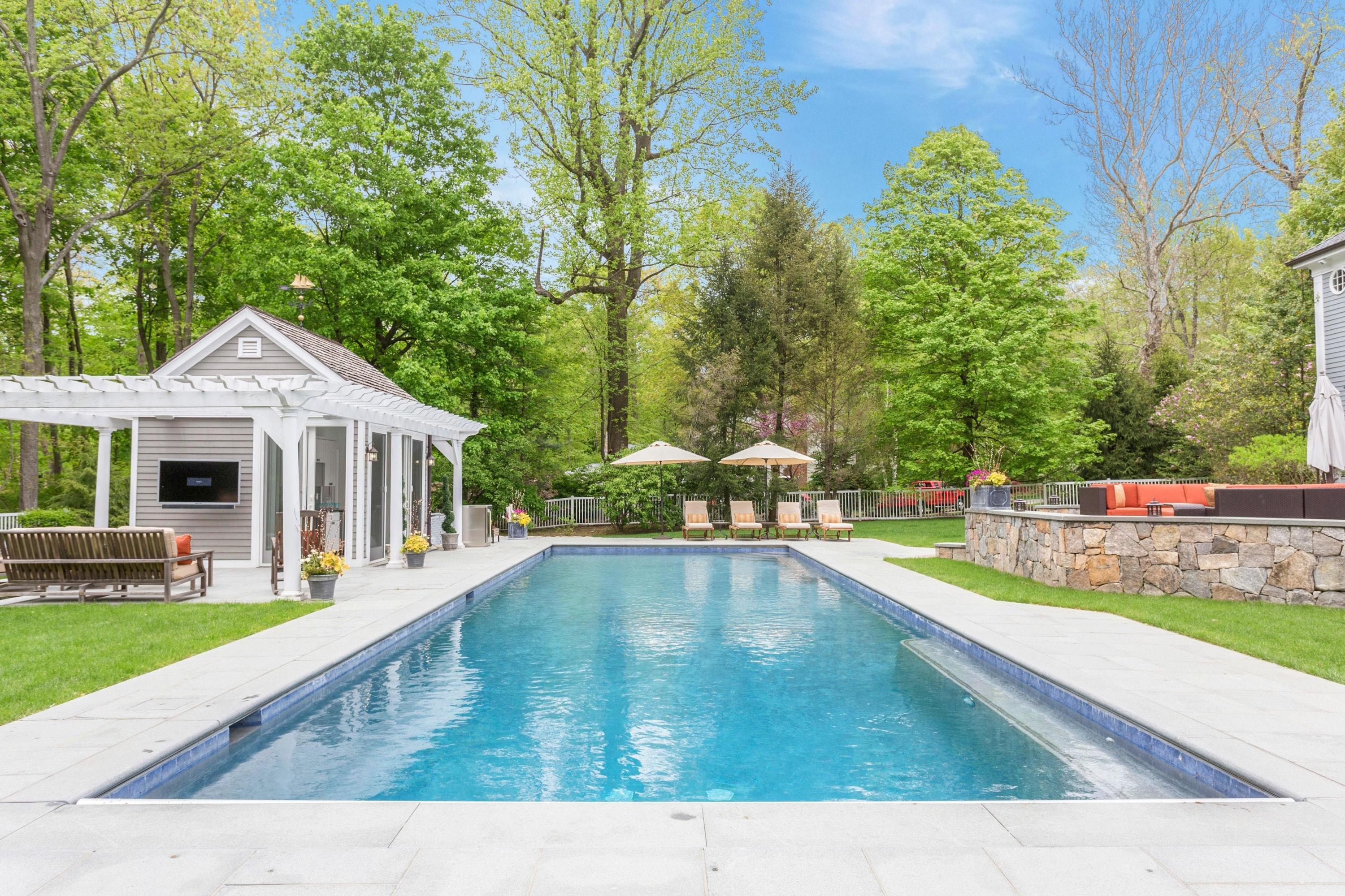 495 Hollow Tree Ridge Road Darien, CT 06820 - Photo 27 of 33 a view of a house with swimming pool