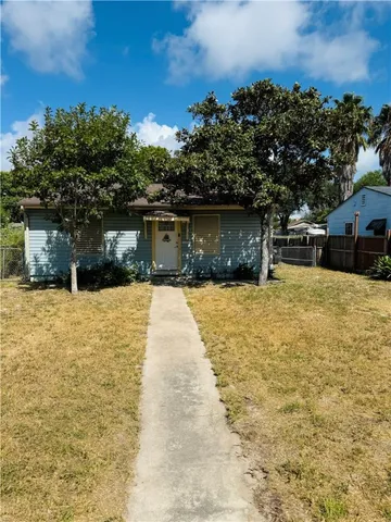 a view of swimming pool with a yard