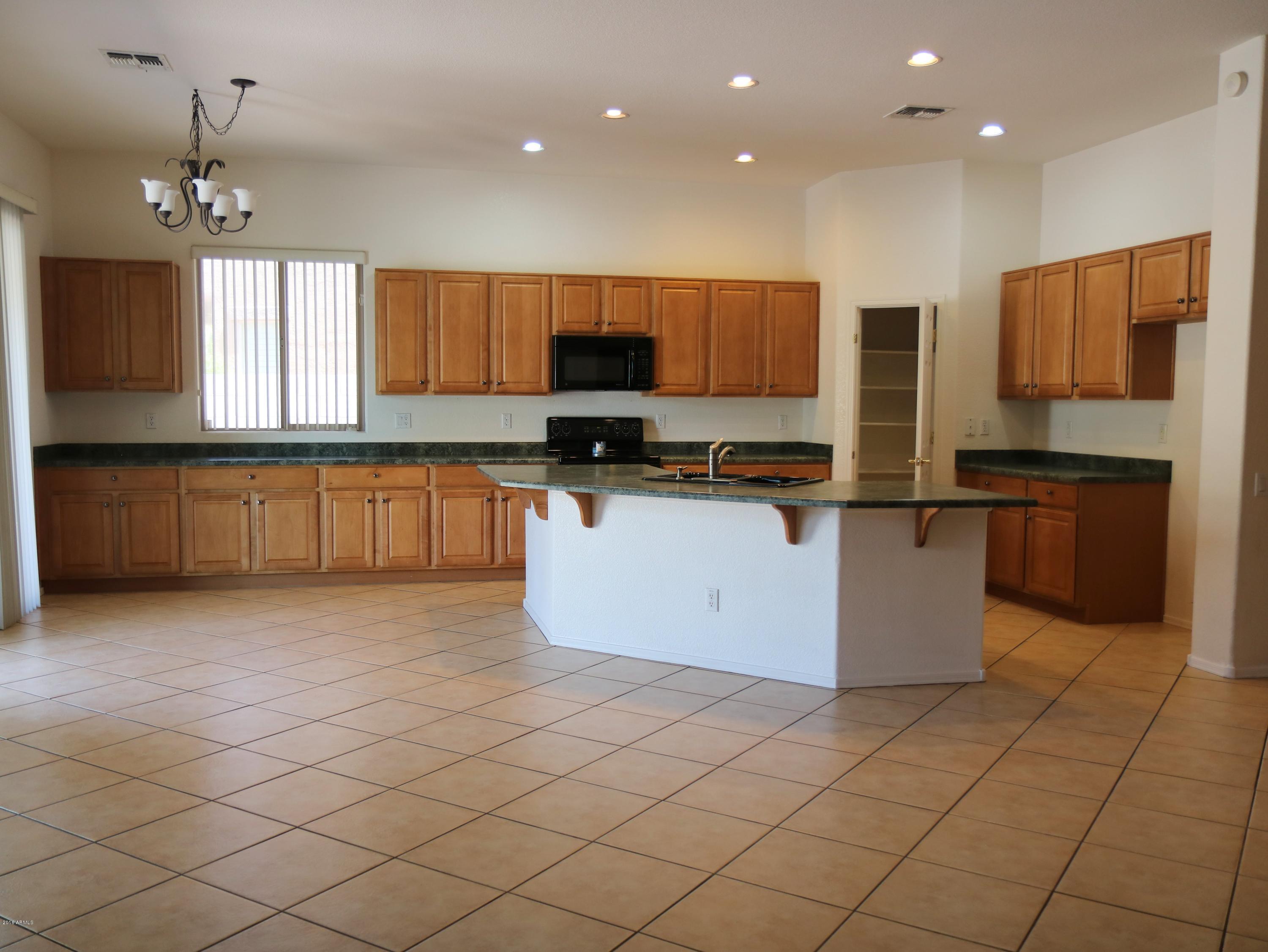 9234 West Rascon Loop Phoenix, AZ 85037 - Photo 3 of 19 KITCHEN 1