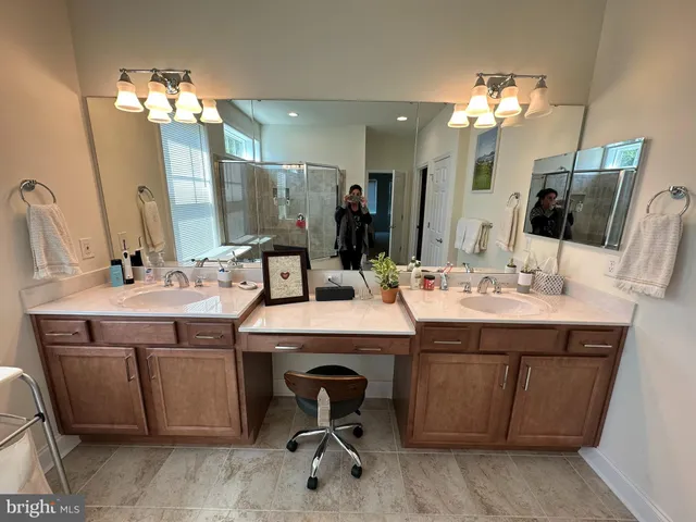a bathroom with a shower and a tub