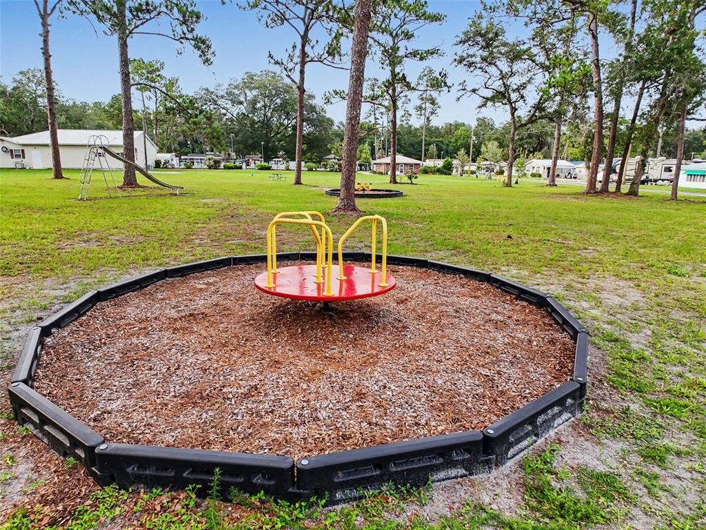 2092 Culbreath Road, Unit A42 Brooksville, FL 34602 - Photo 28 of 70 a view of a park with large trees