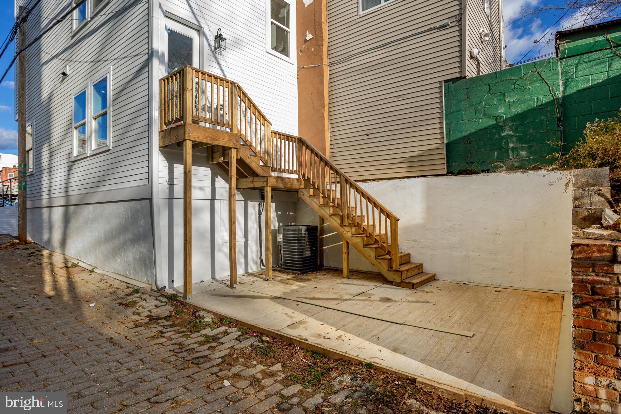 1181 Neal Street Northeast Washington, DC 20002 - Photo 16 of 19 Parking pad easily doubles ad a great back patio!