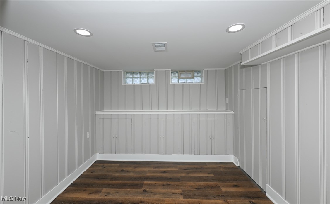 1571 Lander Road Cleveland, OH 44124 - Photo 28 of 39 Below grade area with dark wood-style floors and recessed lighting
