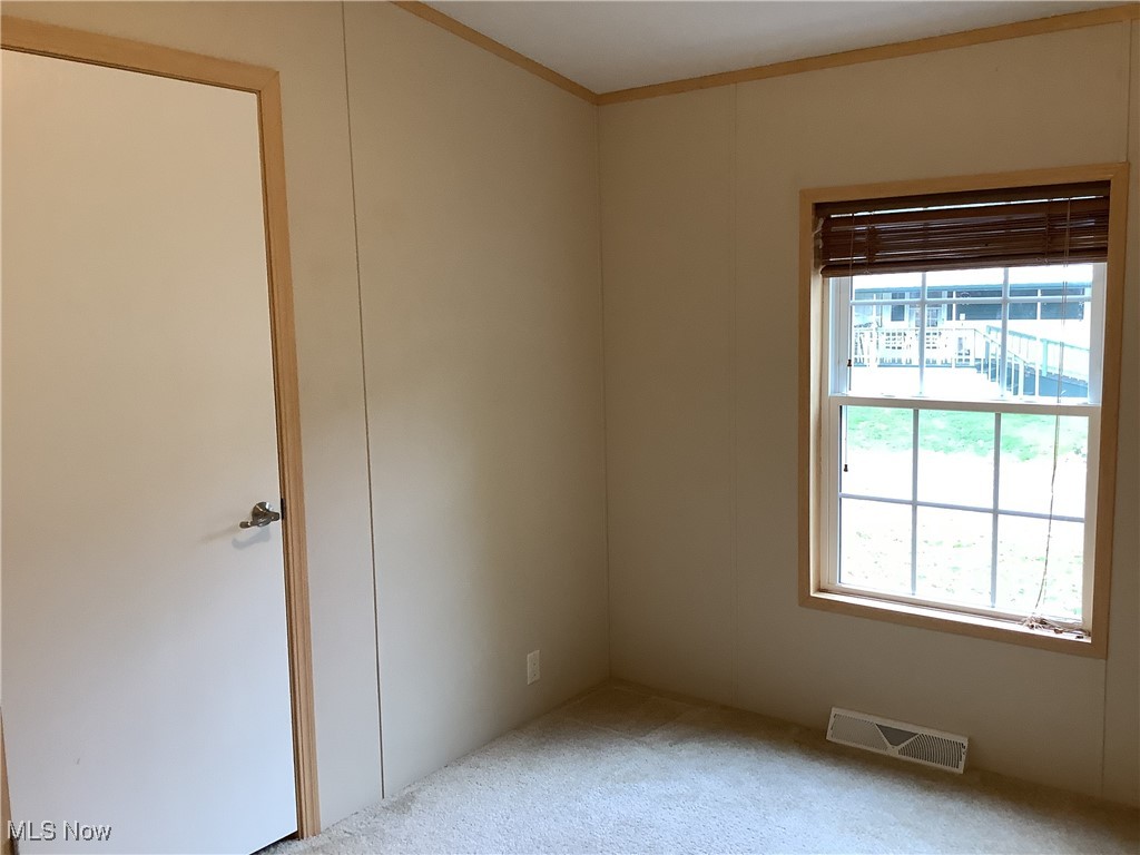 8927 Columbus Road Mount Vernon, OH 43050 - Photo 23 of 35 Bedroom #3 with walk-in-closet and newer carpet.