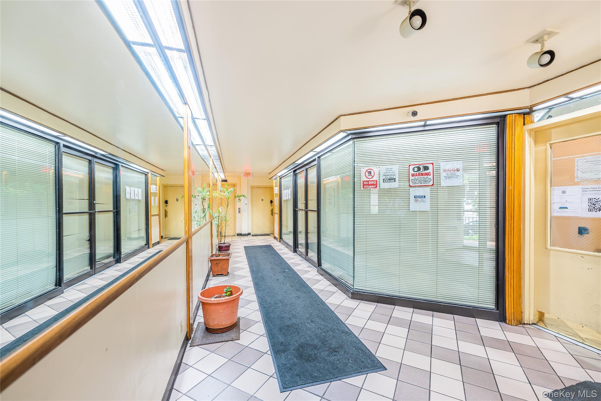 54-09 108th Street, Unit 3A Queens, NY 11368 - Photo 3 of 4 a bathroom with a bathtub and a shower