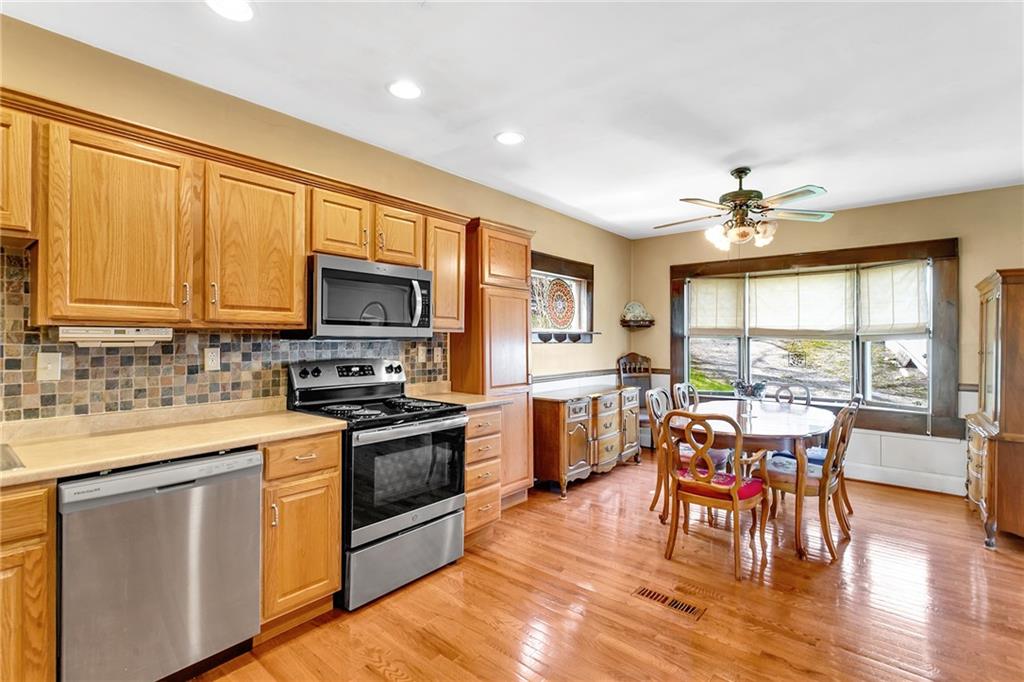 110 Kaylor Road Pittsburgh, PA 15237 - Photo 6 of 23 The wall inbetween the kitchen and dining room was removed making one huge space to dine and entertain