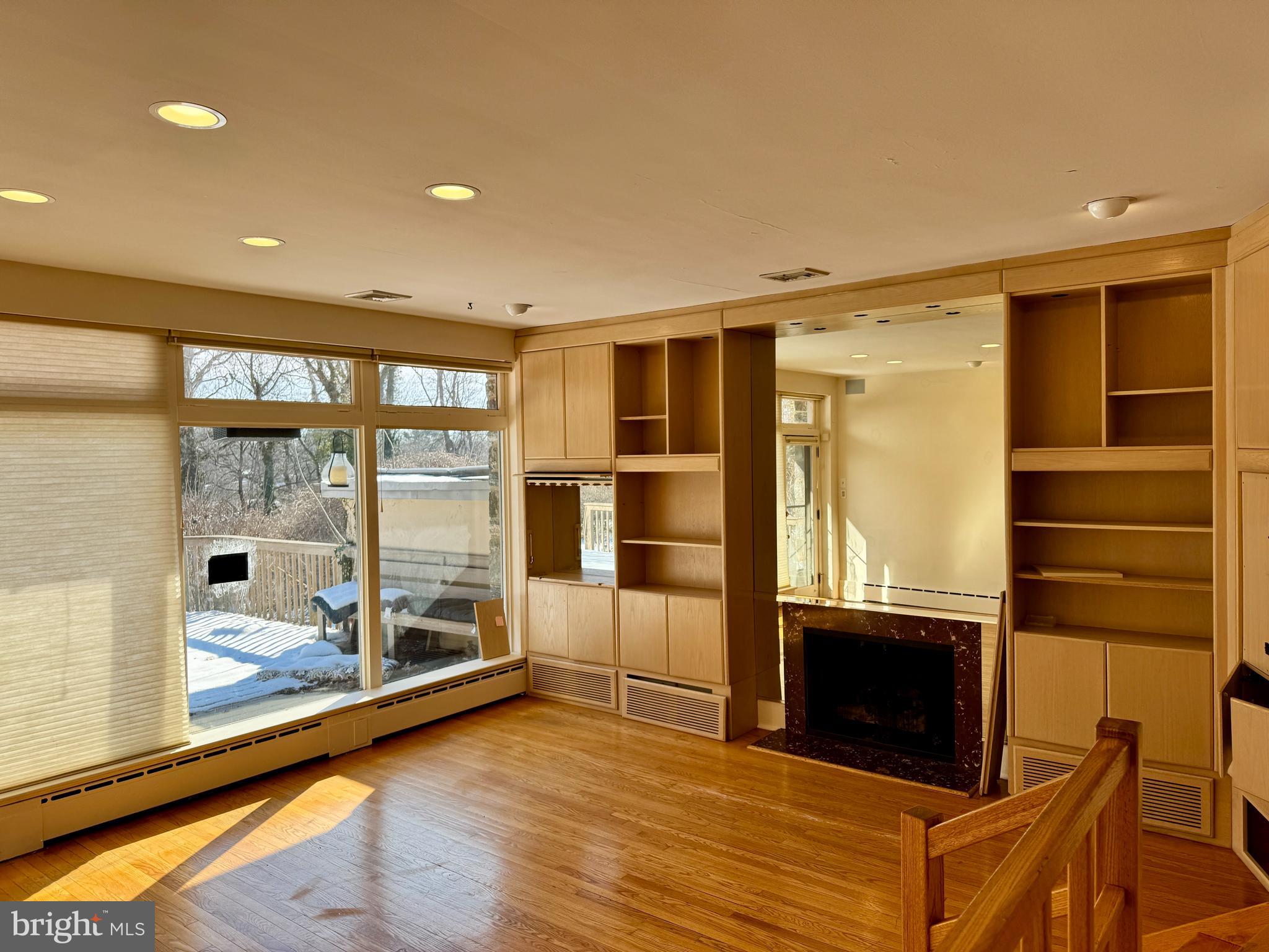 8233 Fairview Road Elkins Park, PA 19027 - Photo 7 of 34 Built ins and cozy fireplace