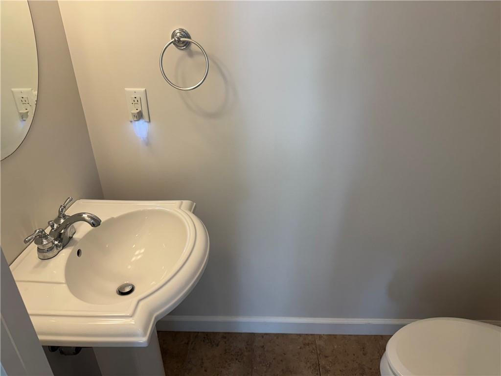 523 East Vanderbilt Drive Mars, PA 16046 - Photo 11 of 32 a bathroom with a sink and mirror with toilet