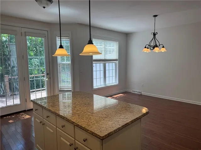 a kitchen with sink and window