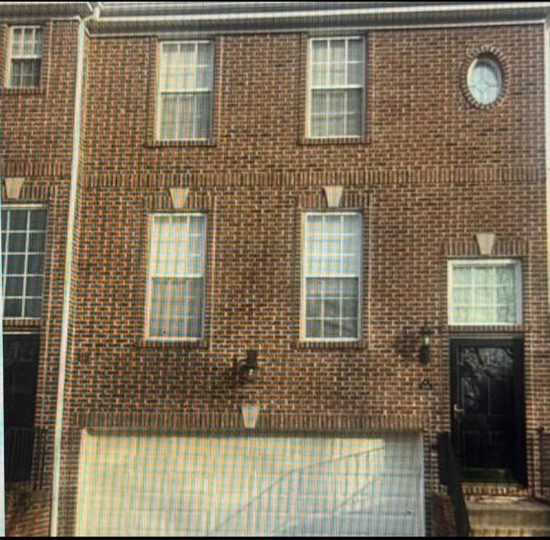 523 East Vanderbilt Drive Mars, PA 16046 - Photo 3 of 32 a view of a brick house with many windows
