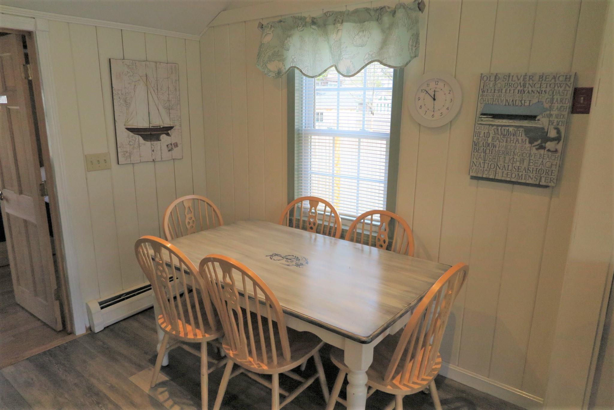 25 Susan Ruth Road Dennis Port, MA 02639 - Photo 13 of 40 a view of a dining room with furniture and window
