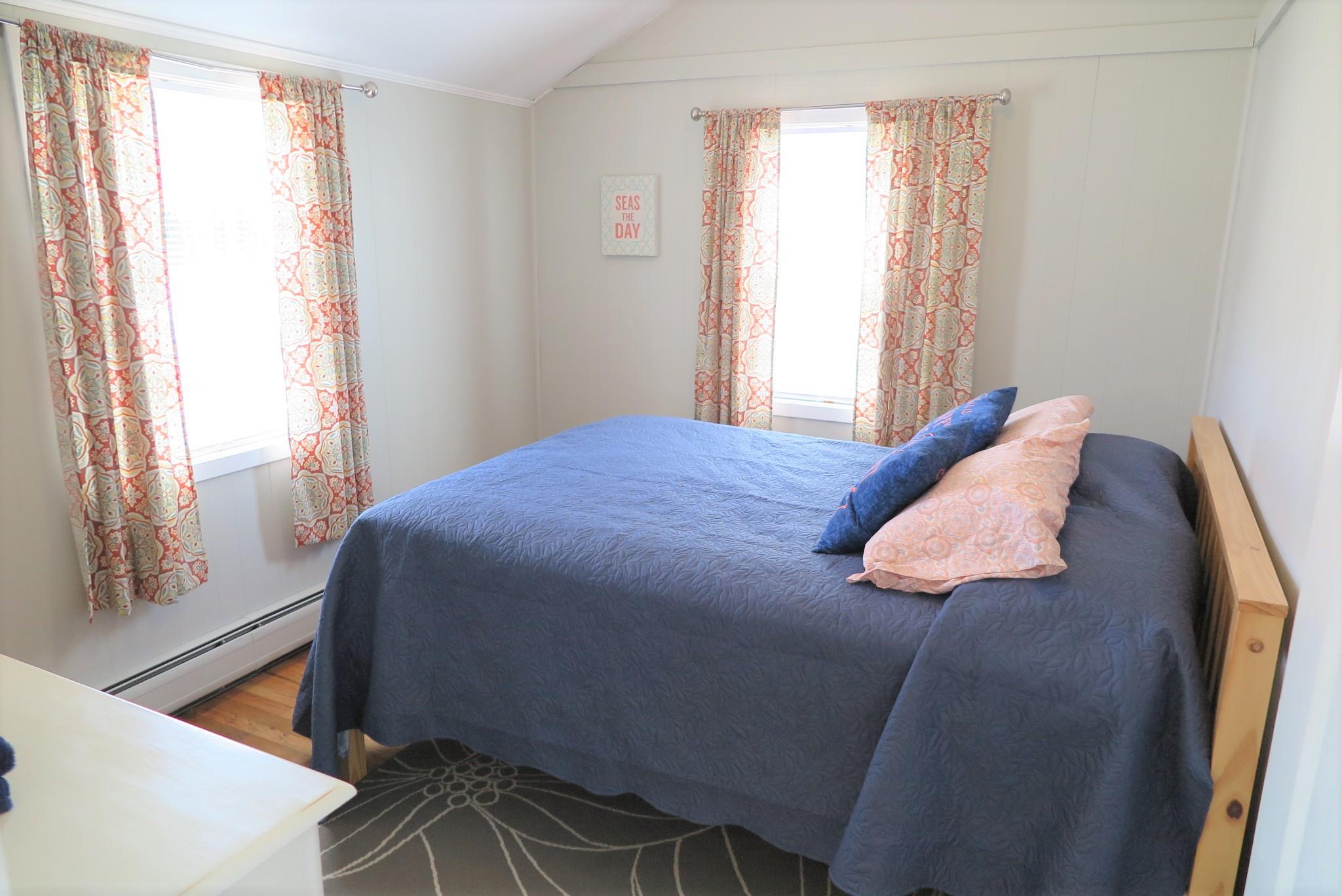 25 Susan Ruth Road Dennis Port, MA 02639 - Photo 15 of 40 a bedroom with a bed and a window