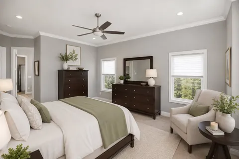 a bedroom with a bed and window