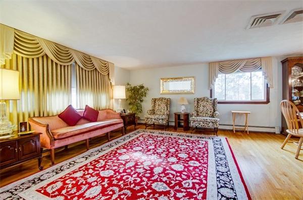 19 Thistle Road Burlington, MA 01803 - Photo 4 of 14 a living room with furniture and a rug