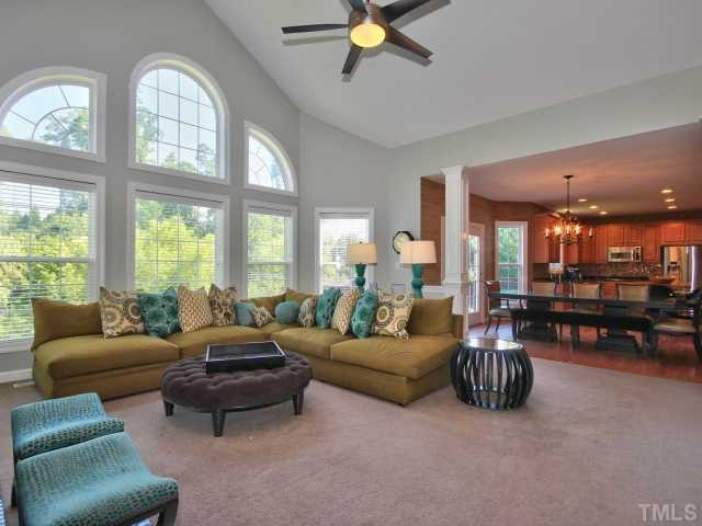 1817 Wescott Drive Raleigh, NC 27614 - Photo 8 of 25 Awesome two story family room with wall of windows, ceiling fan and fireplace! Den/Family/Great Room