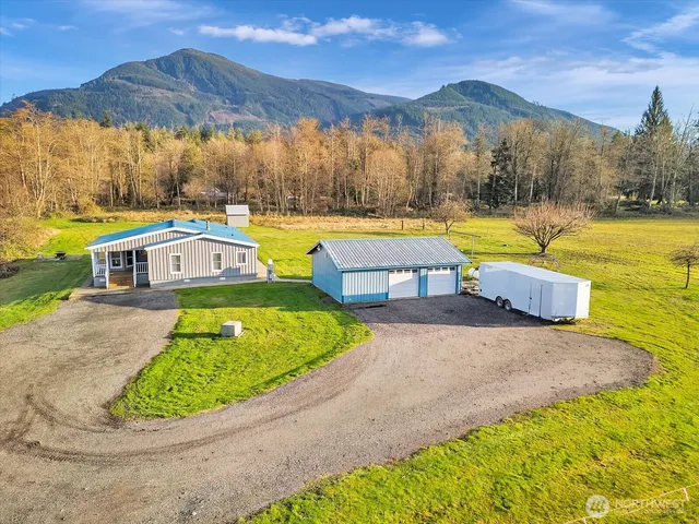a view of a swimming pool with a yard