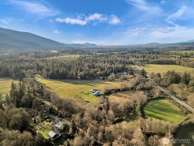 a view of a lake with a mountain in the background