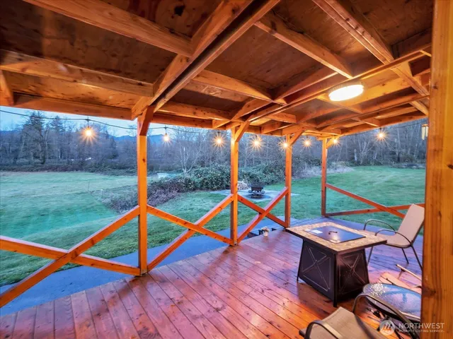 a view of an empty room with a swimming pool