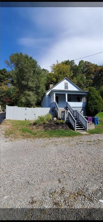 3204 Universal Road Pittsburgh, PA 15235 - Photo 1 of 12 a view of a house with a yard and street