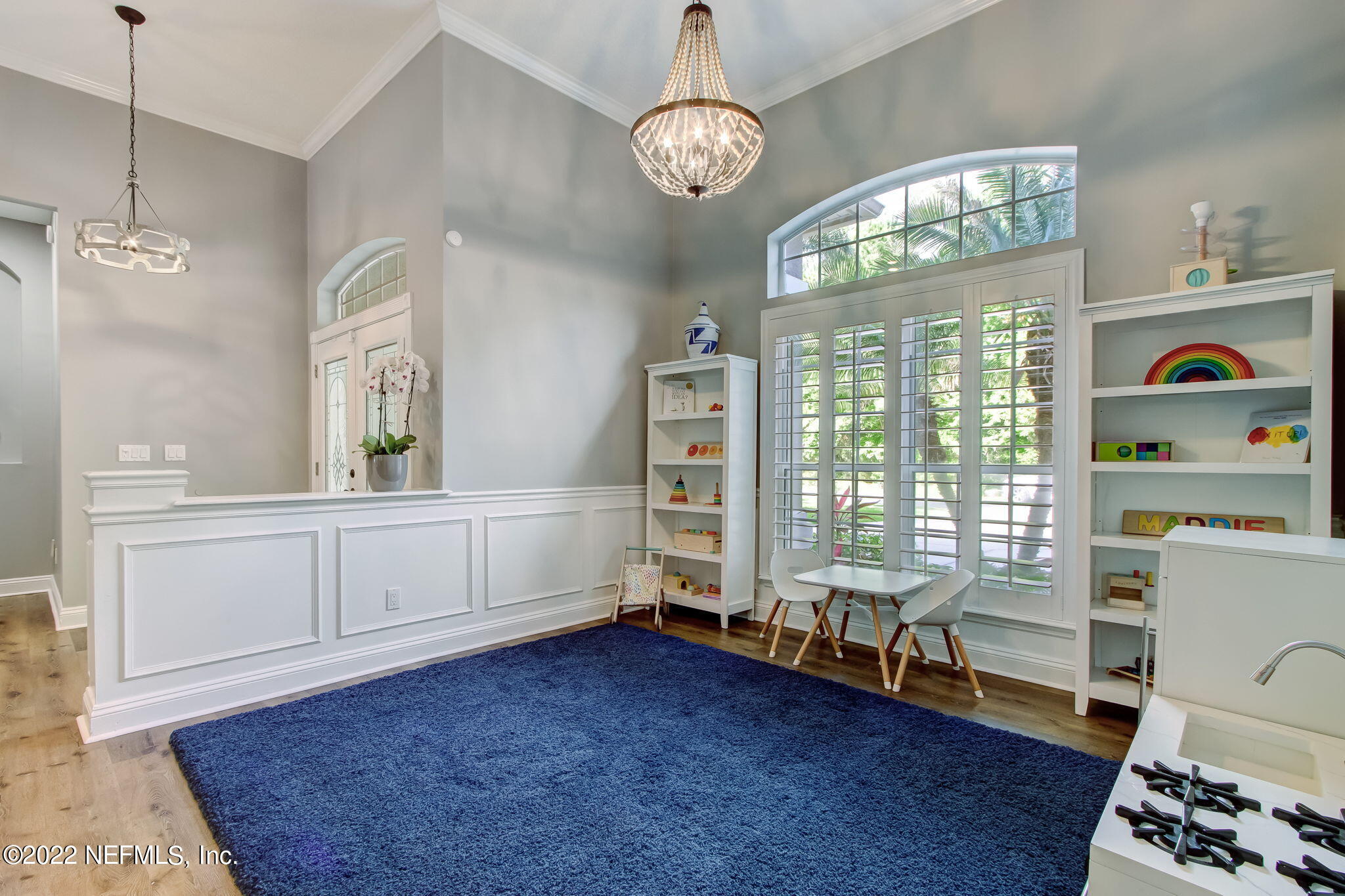 772 Mill Stream Road Ponte Vedra Beach, FL 32082 - Photo 11 of 57 a spacious bedroom with a bed and a chandelier