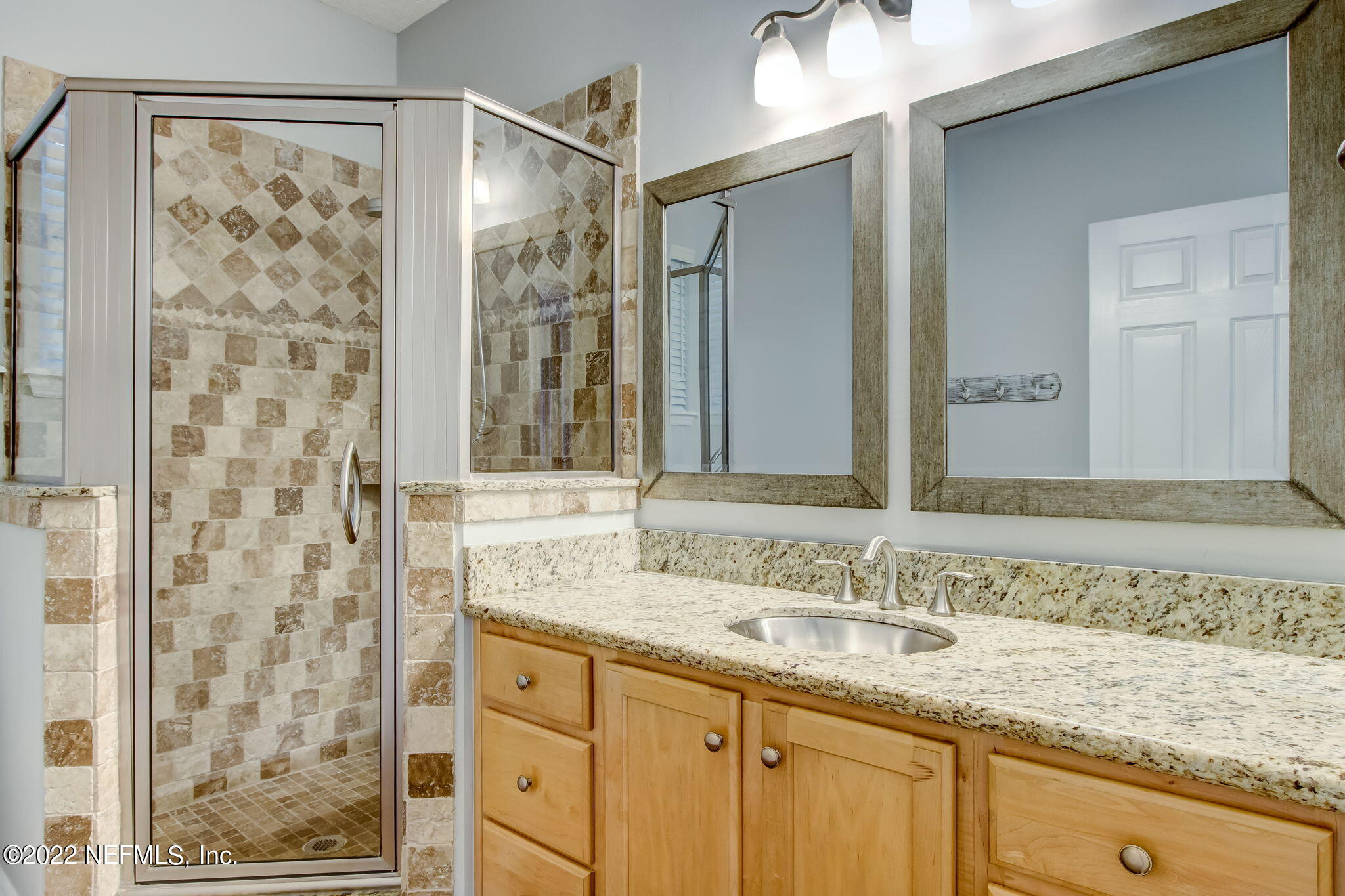 772 Mill Stream Road Ponte Vedra Beach, FL 32082 - Photo 27 of 57 a bathroom with a granite countertop sink mirror and double