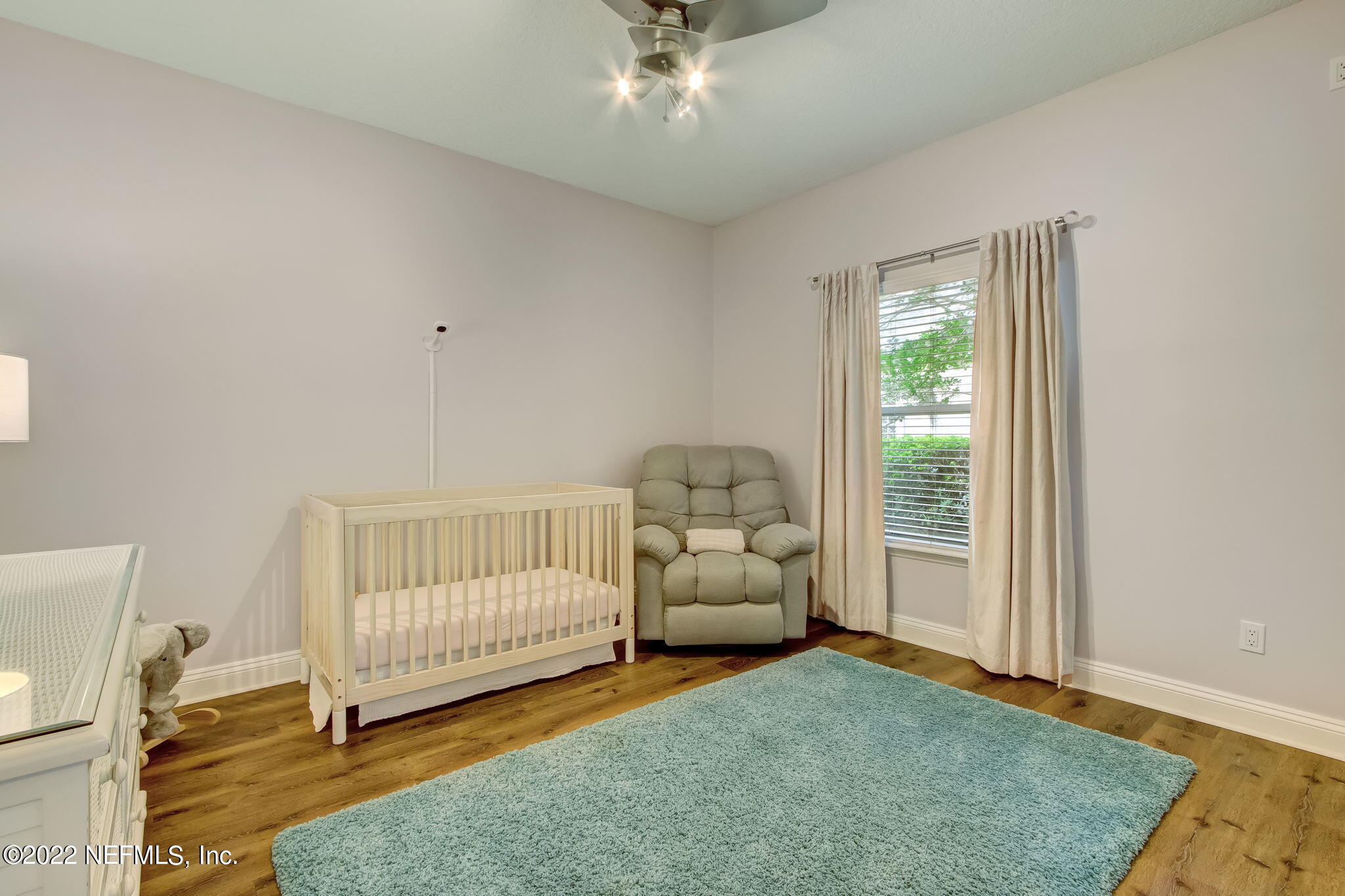 772 Mill Stream Road Ponte Vedra Beach, FL 32082 - Photo 28 of 57 a living room with furniture and a window