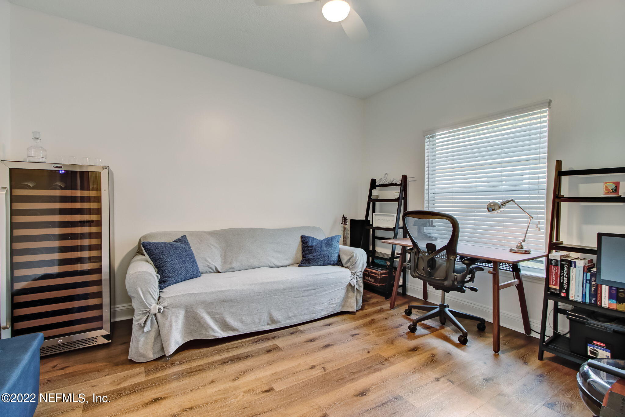 772 Mill Stream Road Ponte Vedra Beach, FL 32082 - Photo 29 of 57 a living room with furniture and a wooden floor