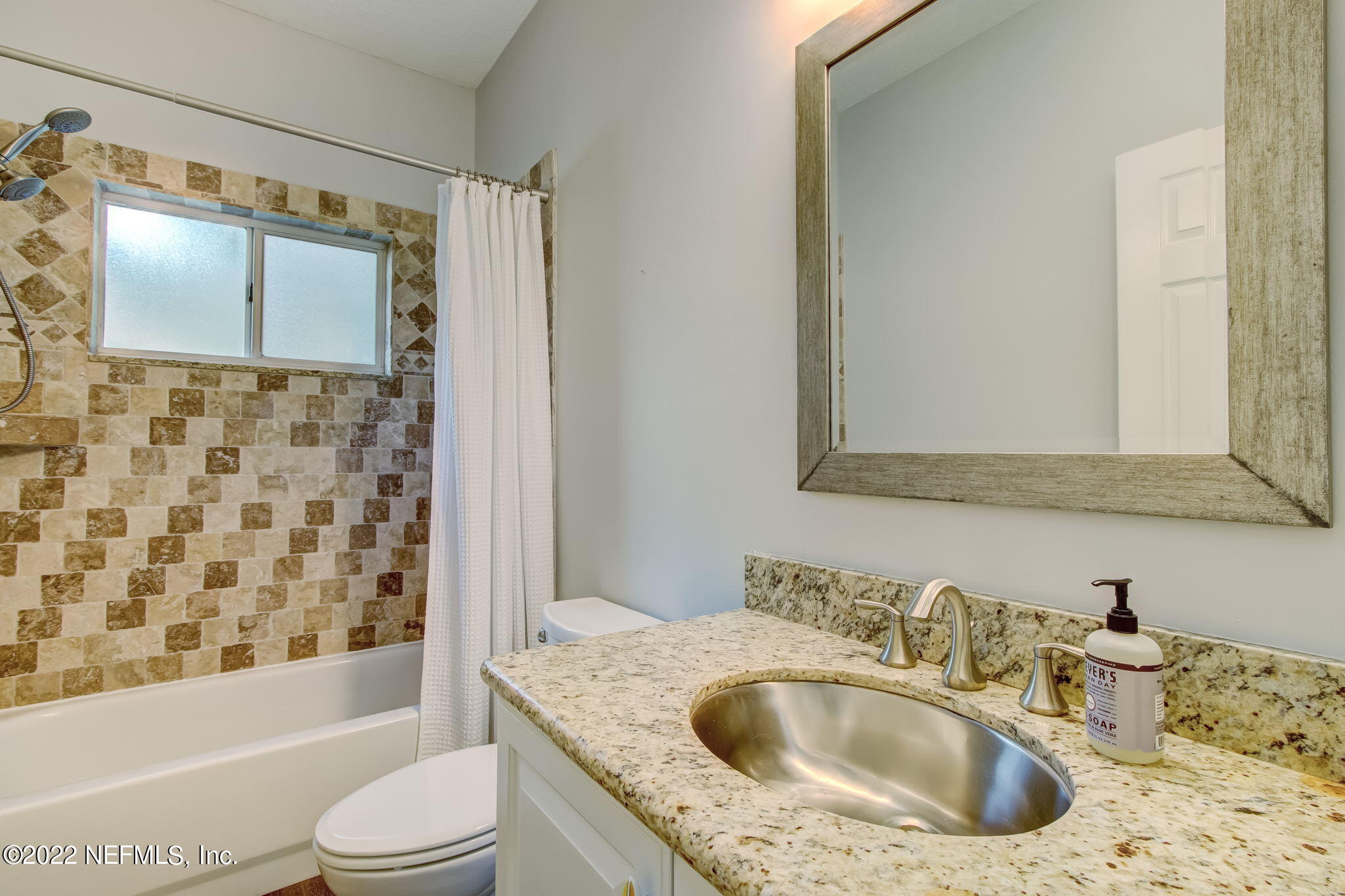 772 Mill Stream Road Ponte Vedra Beach, FL 32082 - Photo 30 of 57 a bathroom with a granite countertop sink a toilet and shower