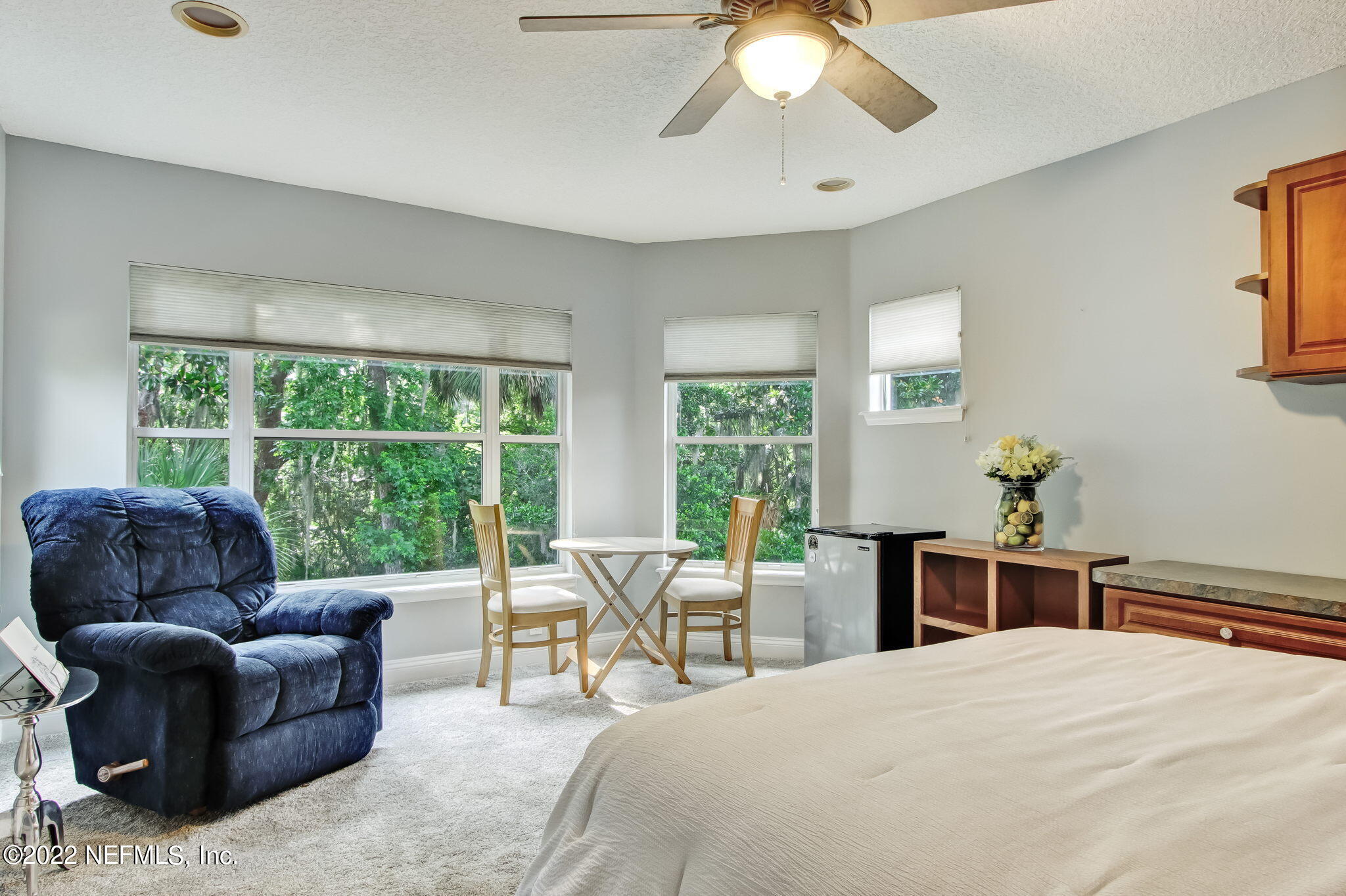 772 Mill Stream Road Ponte Vedra Beach, FL 32082 - Photo 32 of 57 a bedroom with a bed and a large window