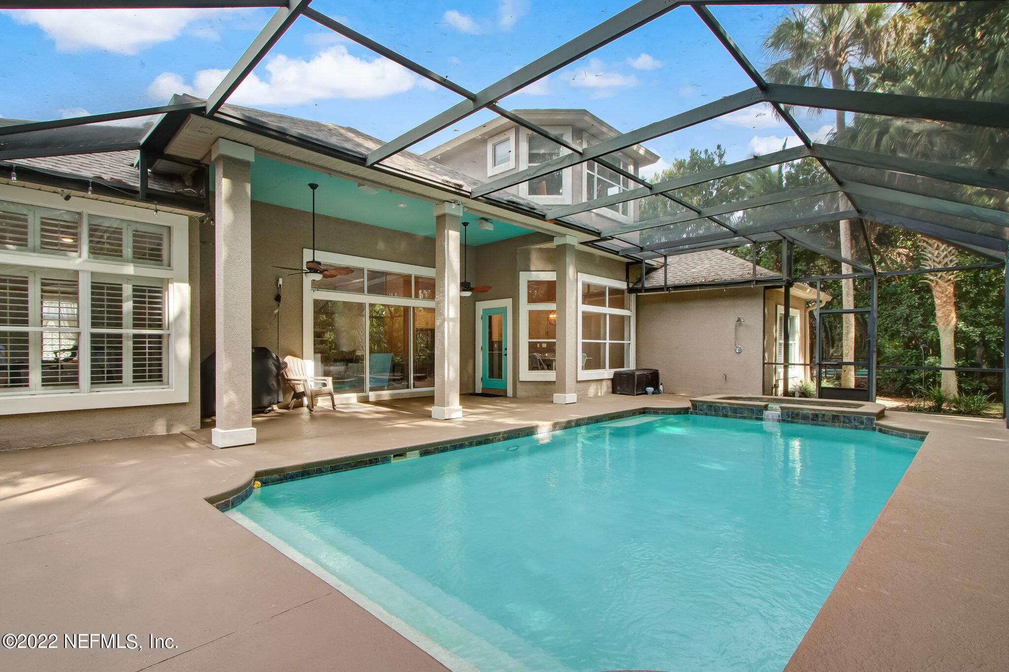 772 Mill Stream Road Ponte Vedra Beach, FL 32082 - Photo 36 of 57 a swimming pool with patio outdoor seating and yard
