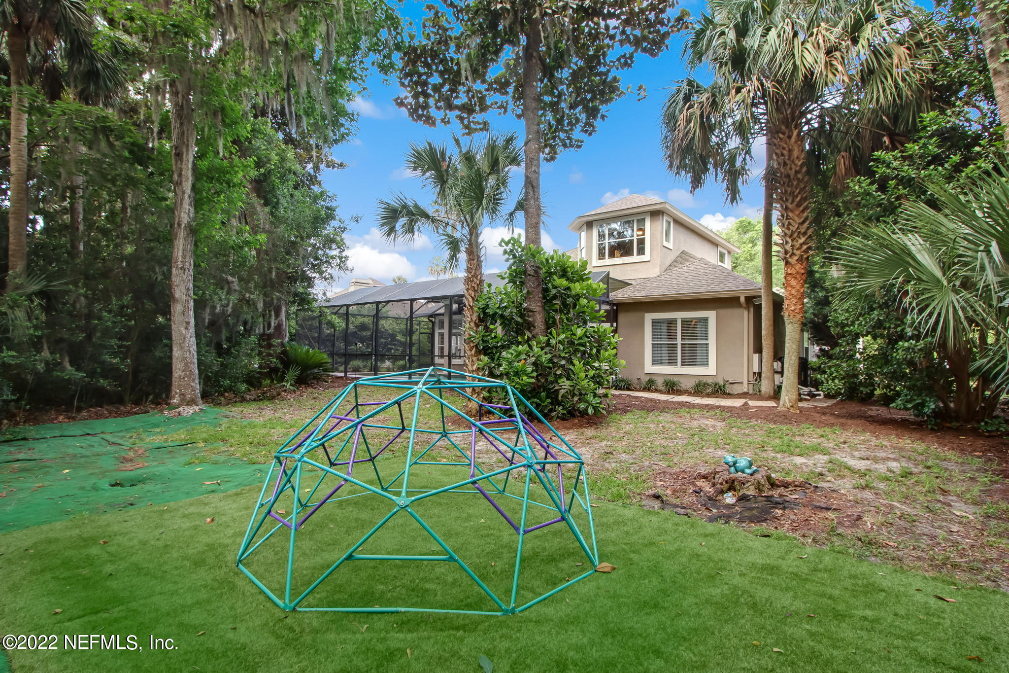 772 Mill Stream Road Ponte Vedra Beach, FL 32082 - Photo 43 of 57 a view of a yard with a house