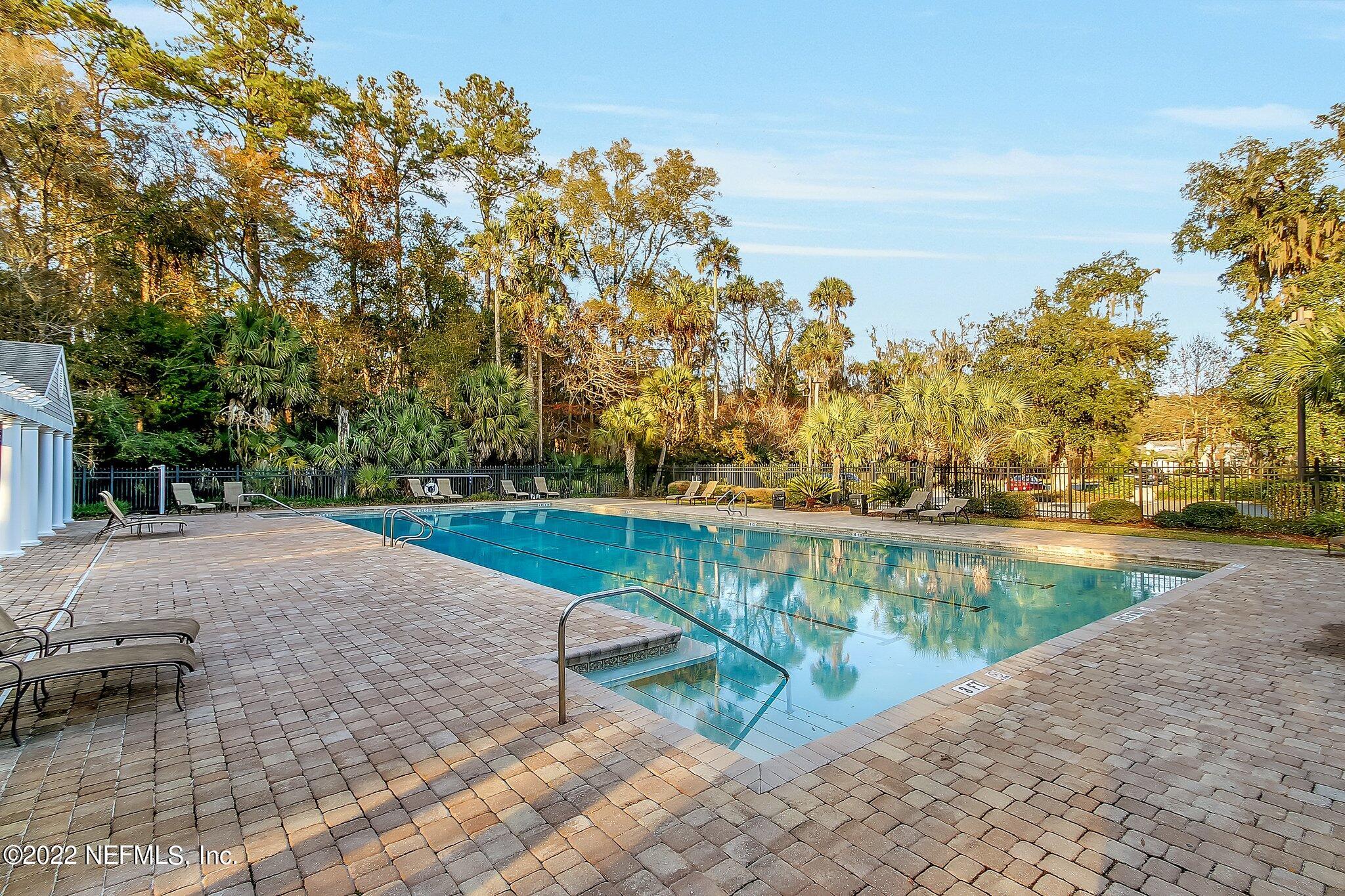 772 Mill Stream Road Ponte Vedra Beach, FL 32082 - Photo 48 of 57 a view of a lake with a trees