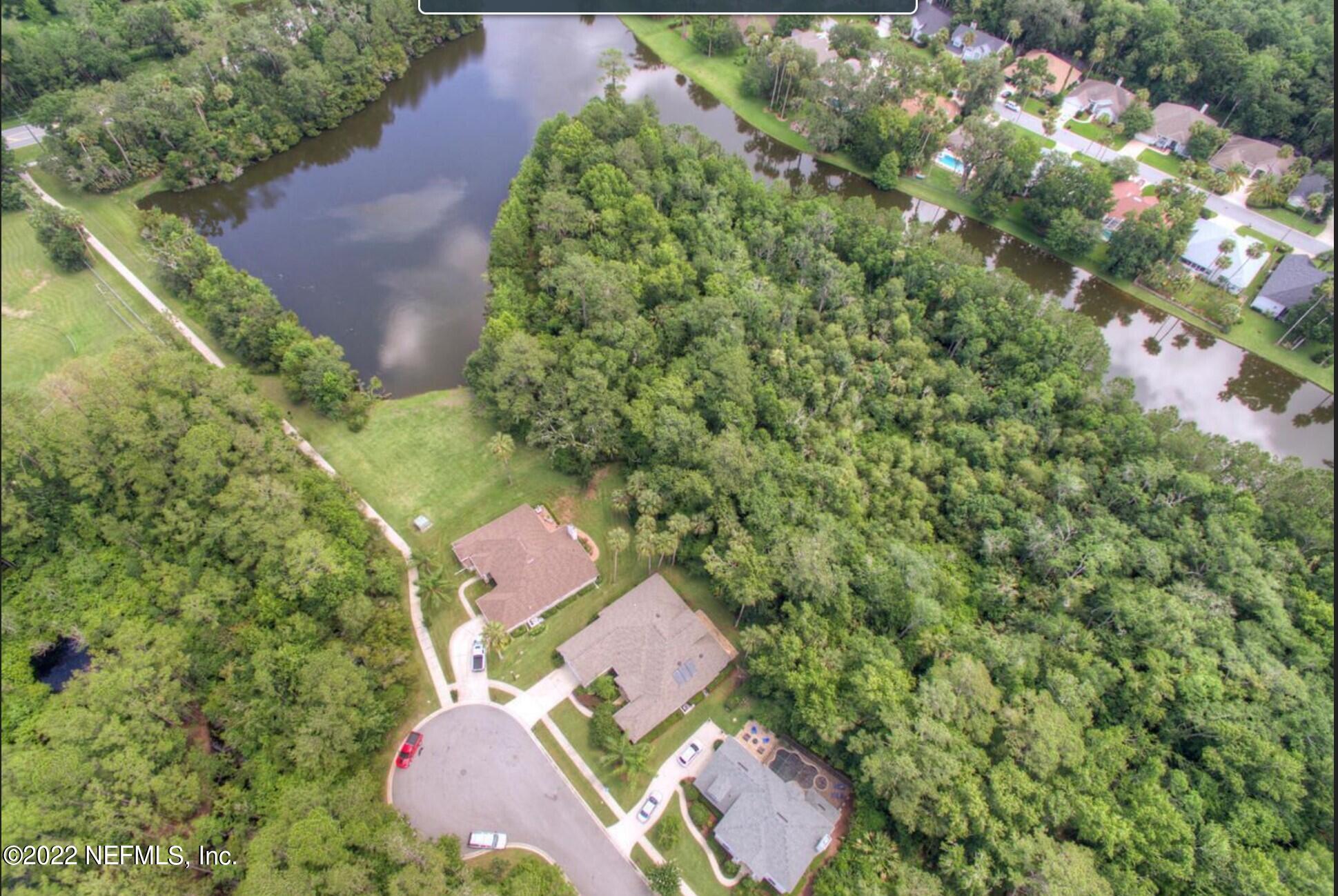 772 Mill Stream Road Ponte Vedra Beach, FL 32082 - Photo 53 of 57 an aerial view of residential house with outdoor space and trees all around