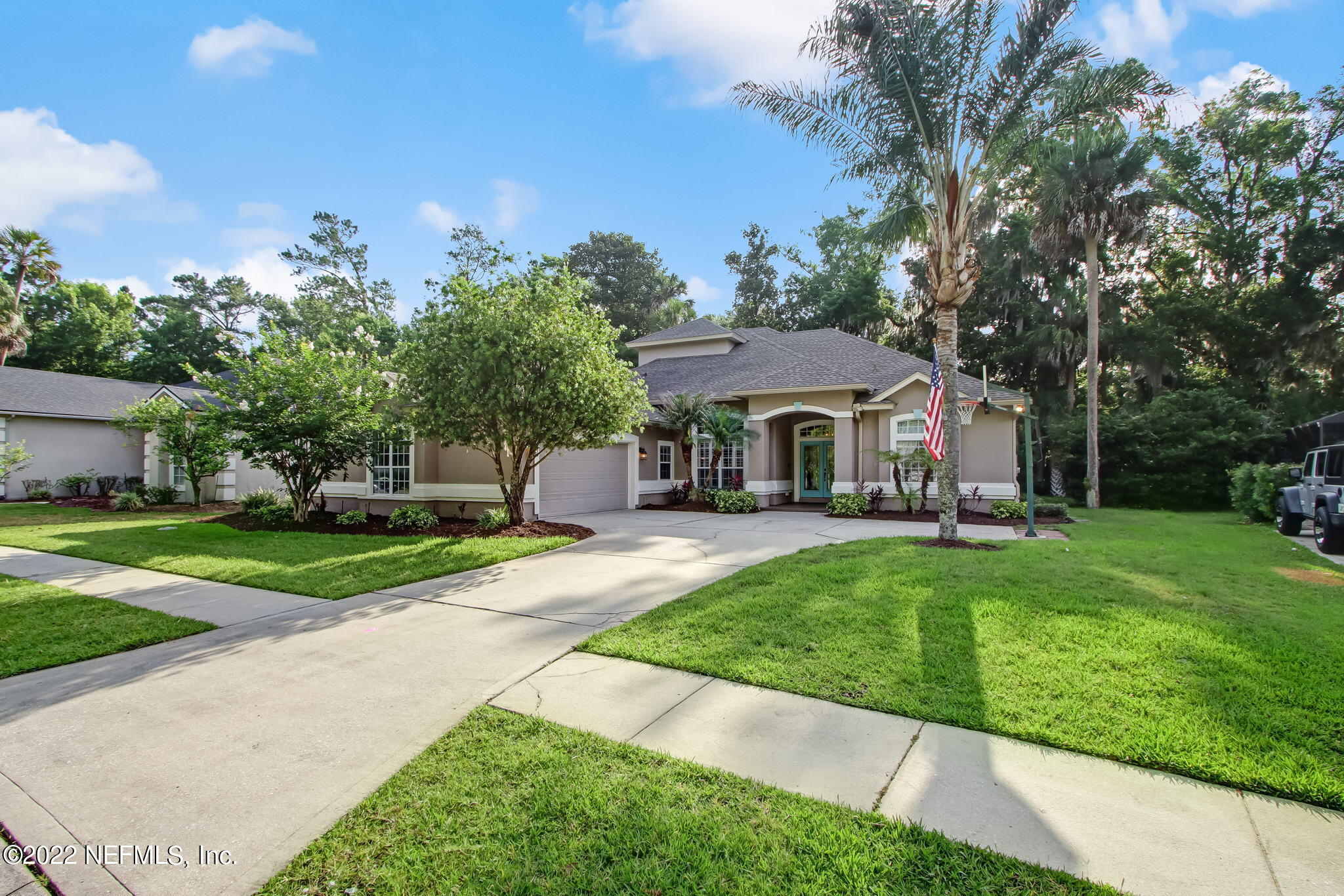 772 Mill Stream Road Ponte Vedra Beach, FL 32082 - Photo 5 of 57 a front view of a house with yard and green space