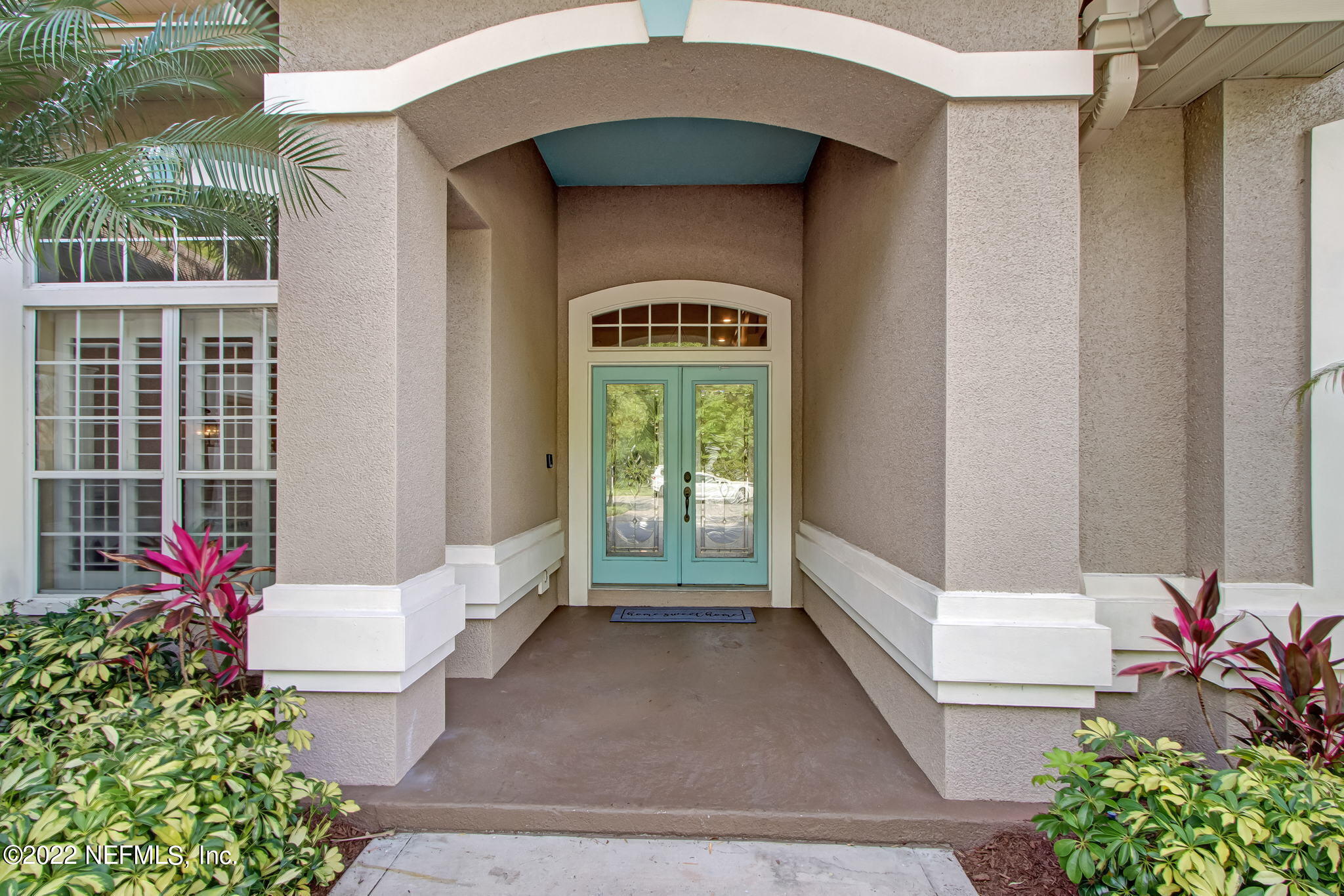 772 Mill Stream Road Ponte Vedra Beach, FL 32082 - Photo 7 of 57 a front view of a house with a yard