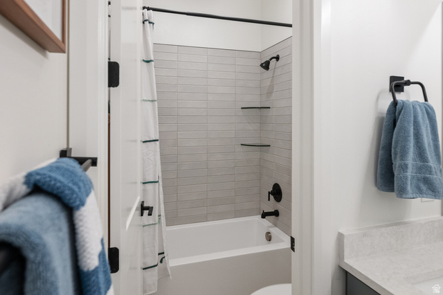 11617 South Wildrye Field Way Draper, UT 84020 - Photo 27 of 53 Bathroom with shower / bath combo with shower curtain and double vanity