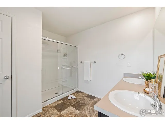 a kitchen with a sink and a stove top oven